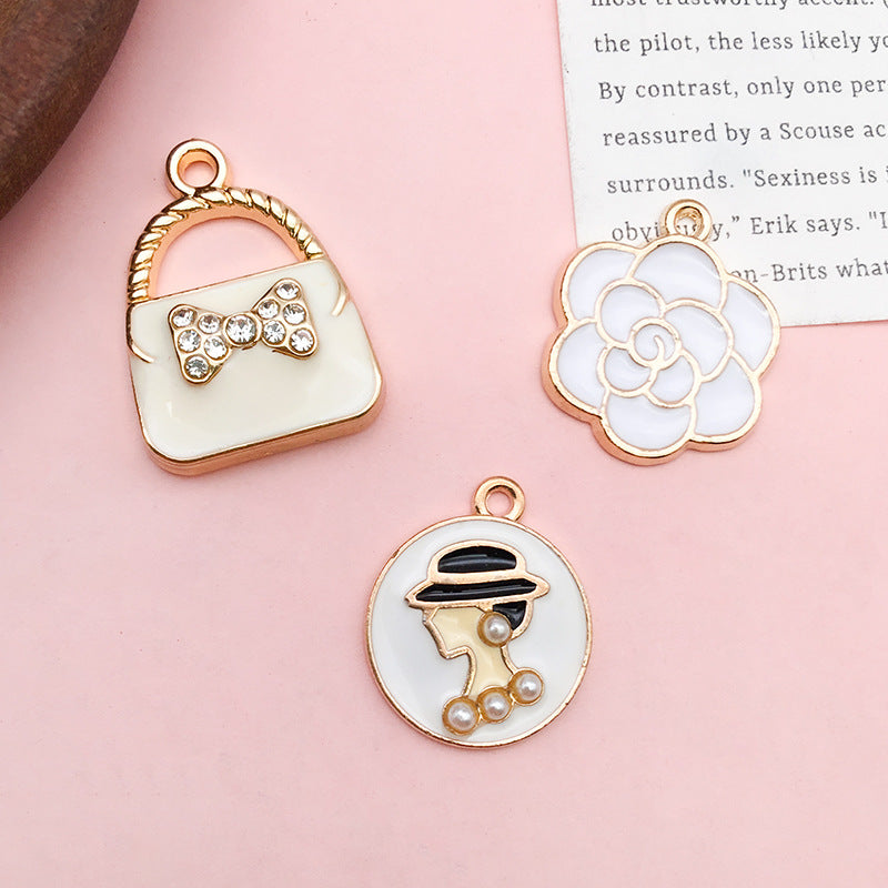 Wholesale Personalized Alloy Oil Dripping Pearl Eye Shadow Flower Perfume Bottle Diy Necklace Pendant Accessories